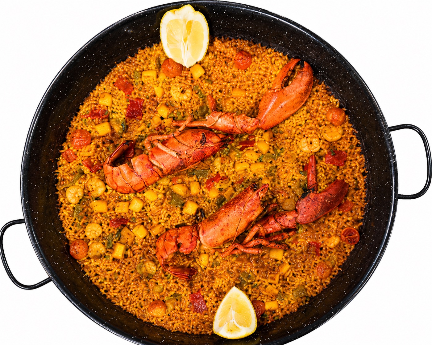 Paella de llagosta acabada de fer, amb gambes i llimona